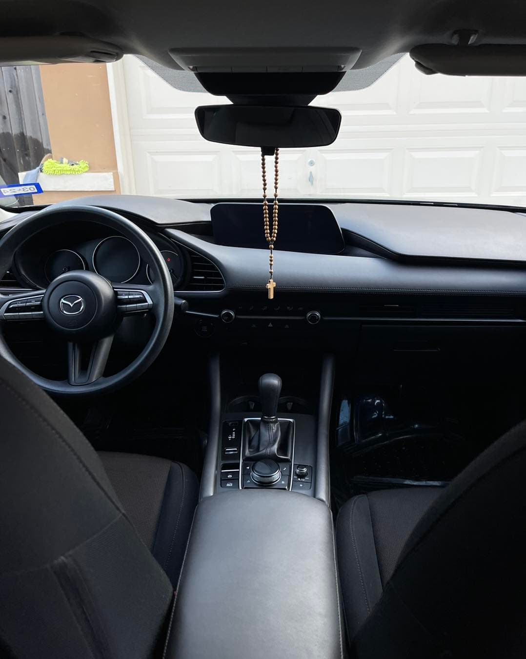 Mazda3 cabin cleaned inside, black dashboard and seats detailed to a fresh finish