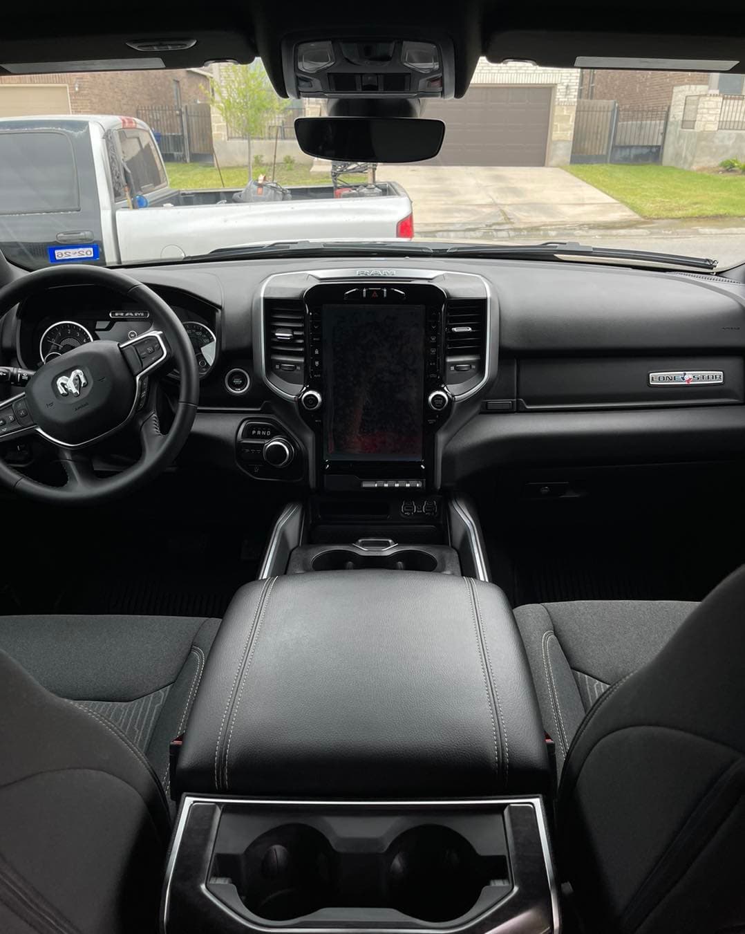 RAM 1500 Lone Star cabin with black interior detailed, dashboard and seats spotless